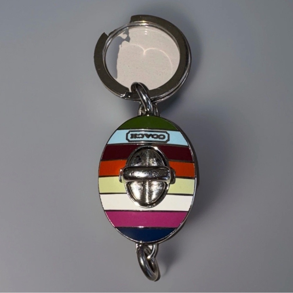 Coach Legacy Stripe turnlock valet key chain in silver-tone metal